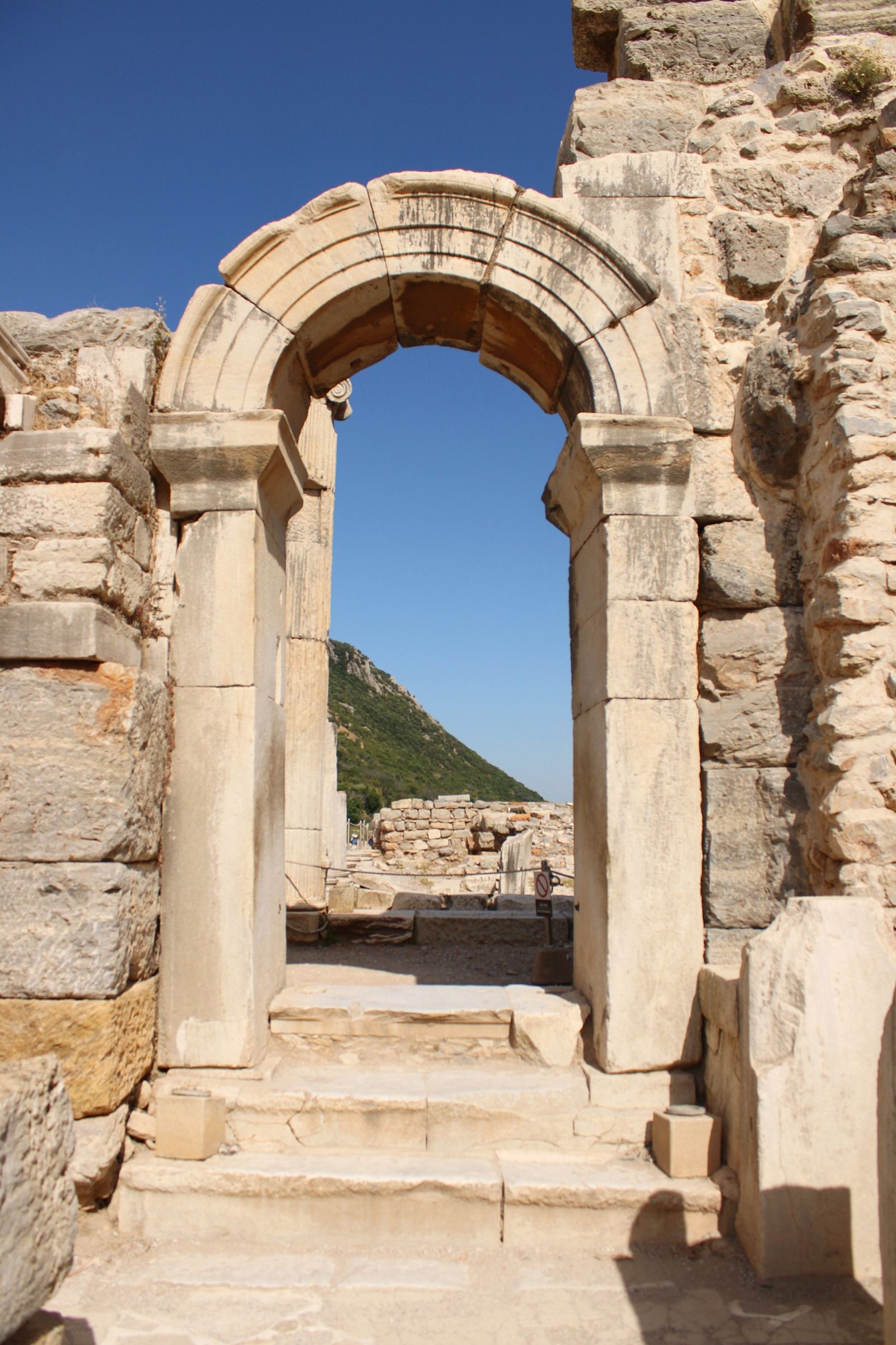 Stone archway in the ruins of Ephesus